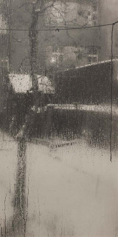 Photographie avec effets d'eau et de buée par Josef Sudek.